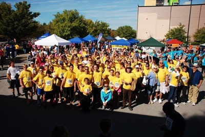 large group of people in yellow shirts